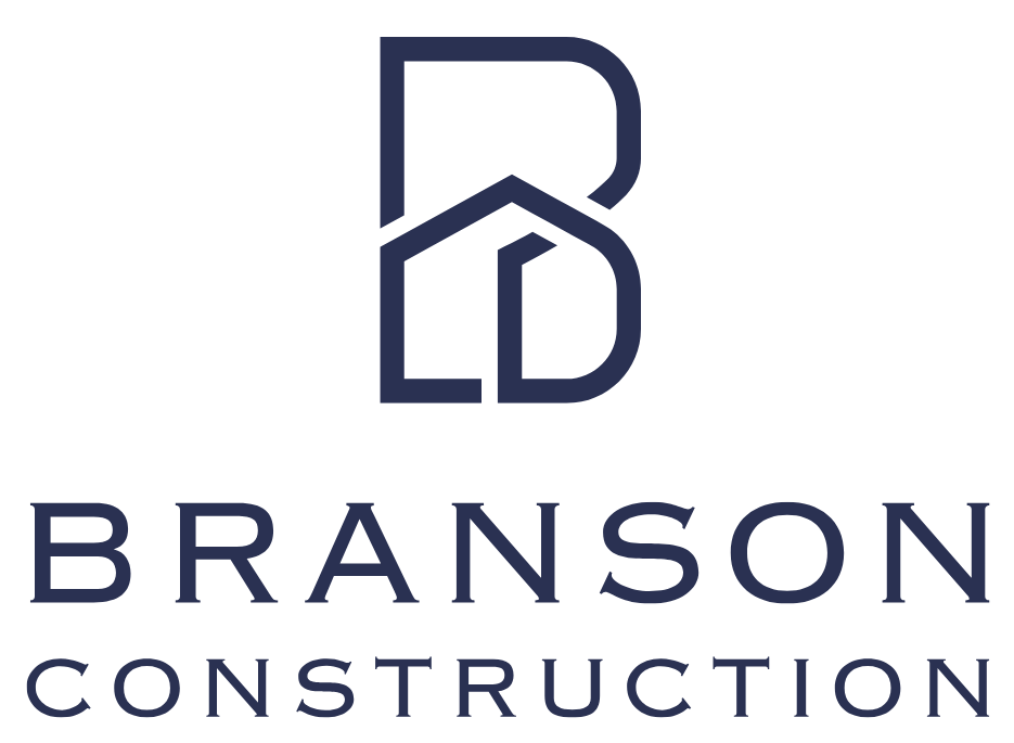 Navy blue logo for Branson Construction, featuring a stylized letter "B" that incorporates the outline of a house above the company name written in bold, uppercase letters.