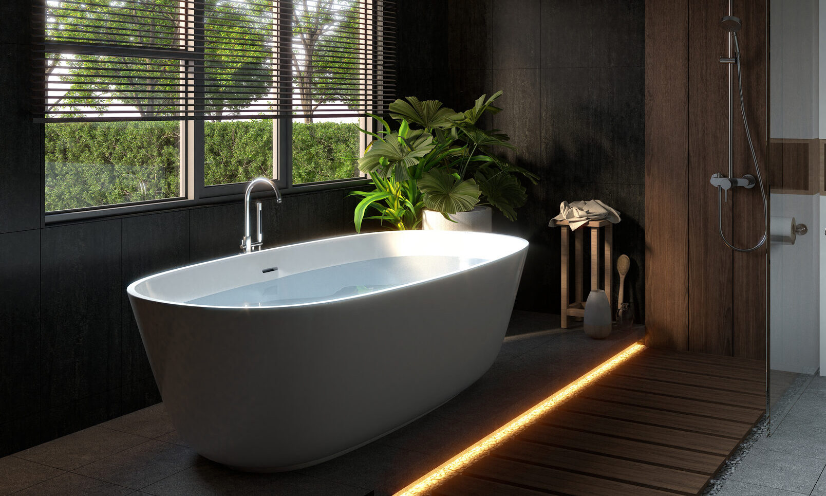 Modern bathroom with a freestanding white bathtub near a large window, a green plant, a wooden stool with towels, a walk-in shower, and soft natural light streaming in.